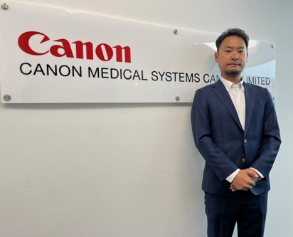 Canon medical logo with a man